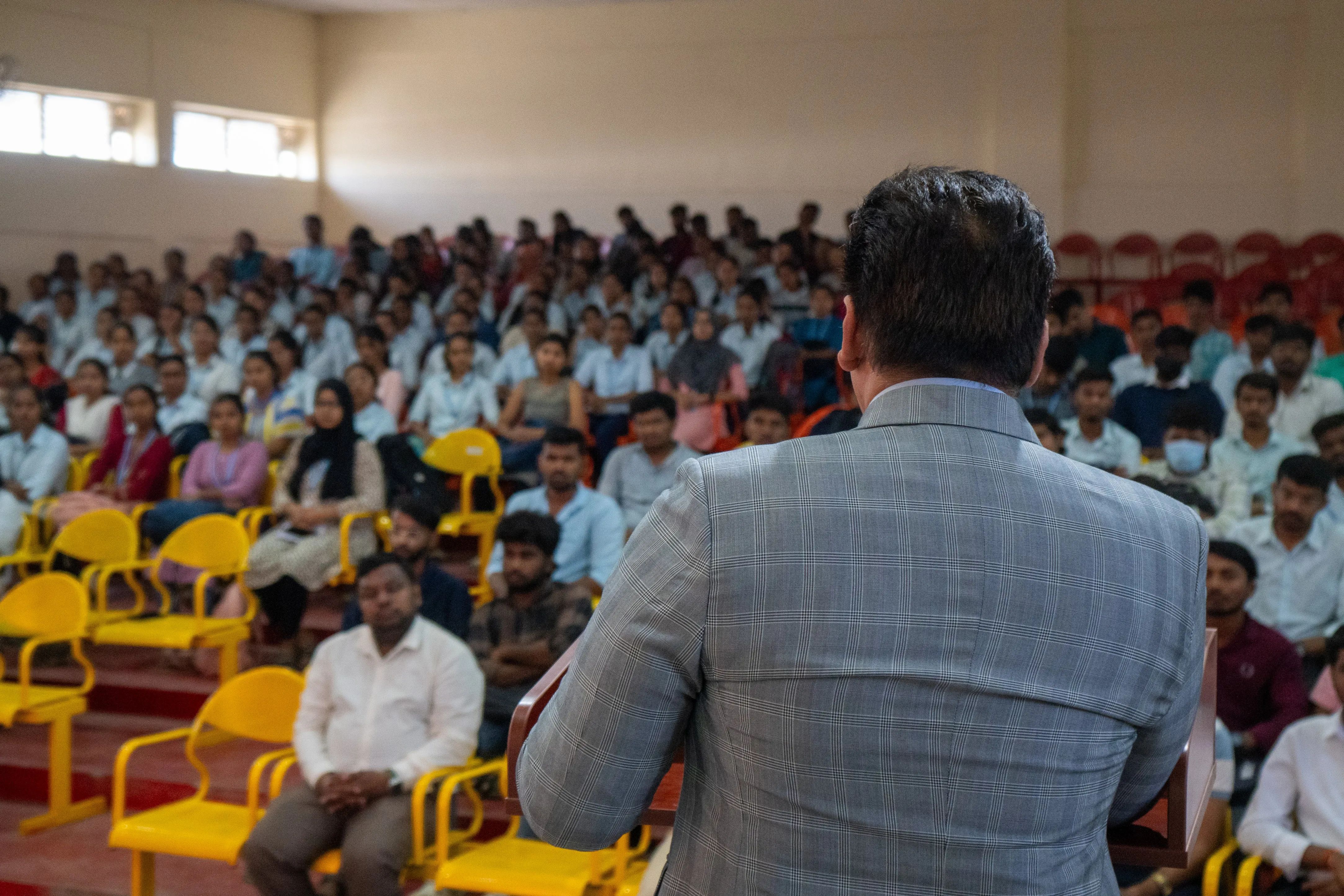 Jitesh Bajaj speaking to students at a college