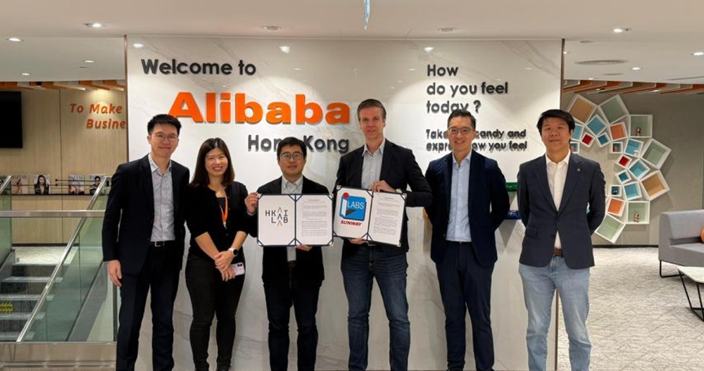 Representatives from HKAI Lab and Sunway iLabs exchange  signed copies of MoU, formalising a strategic AI collaboration to advance cross-border innovation and partnerships between Malaysia, Hong Kong, and the wider Greater Bay Area.