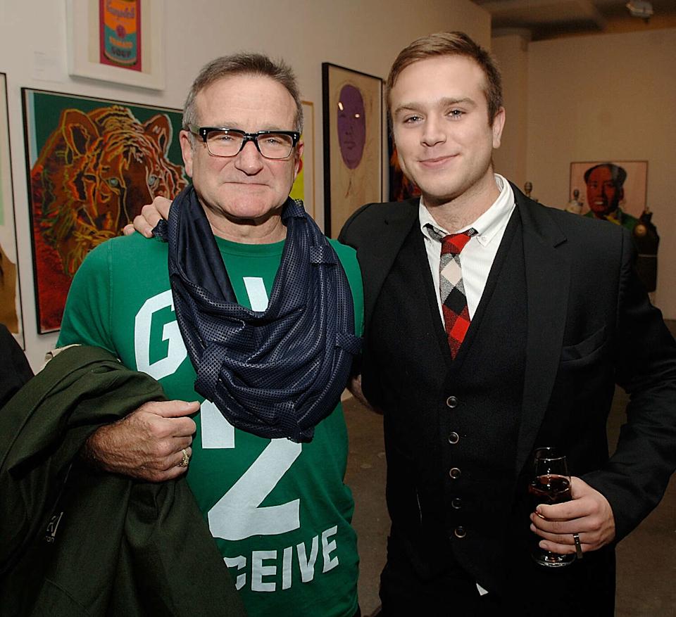 Robin Williams, left, and his son Zak Williams at the Timo Pre Fall 2009 Launch with Interview Magazine at Phillips De Pury in New York City in 2008. (Jamie McCarthy/WireImage for Timo Wallets LLC)