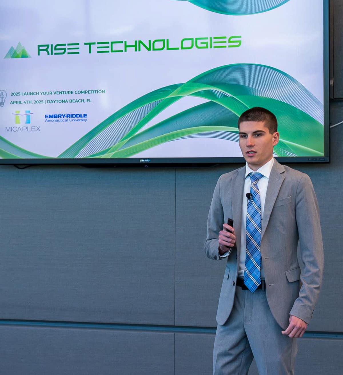 Embry-Riddle student Seth Miller earned second place for Rise Technologies LLC, which is developing an upper-body rehabilitation exoskeleton device for stroke victims.