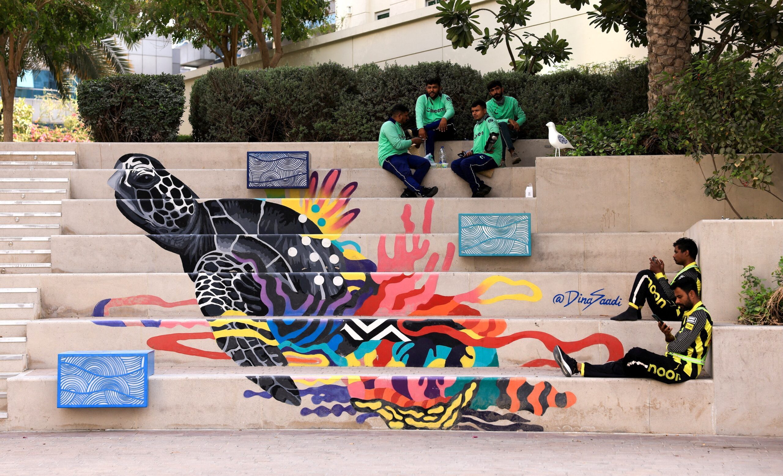 Delivery drivers take a break in Dubai Marina. Funding across many startup sectors could be affected by the Iran war