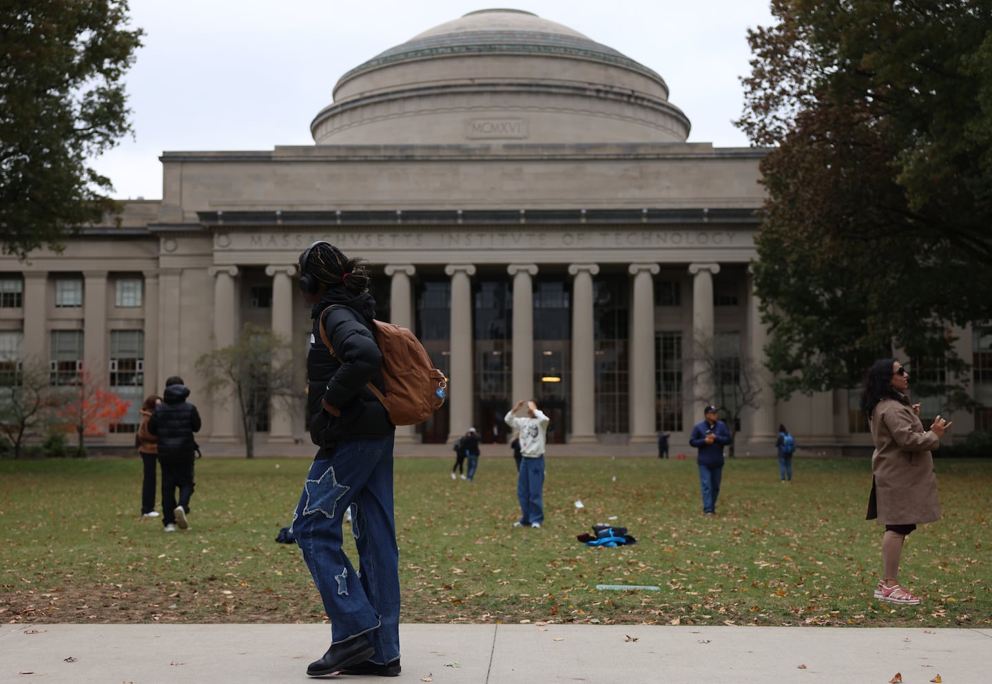 People stopped to take pictures outside of the Great Dome at MIT in Cambridge on Oct. 28.