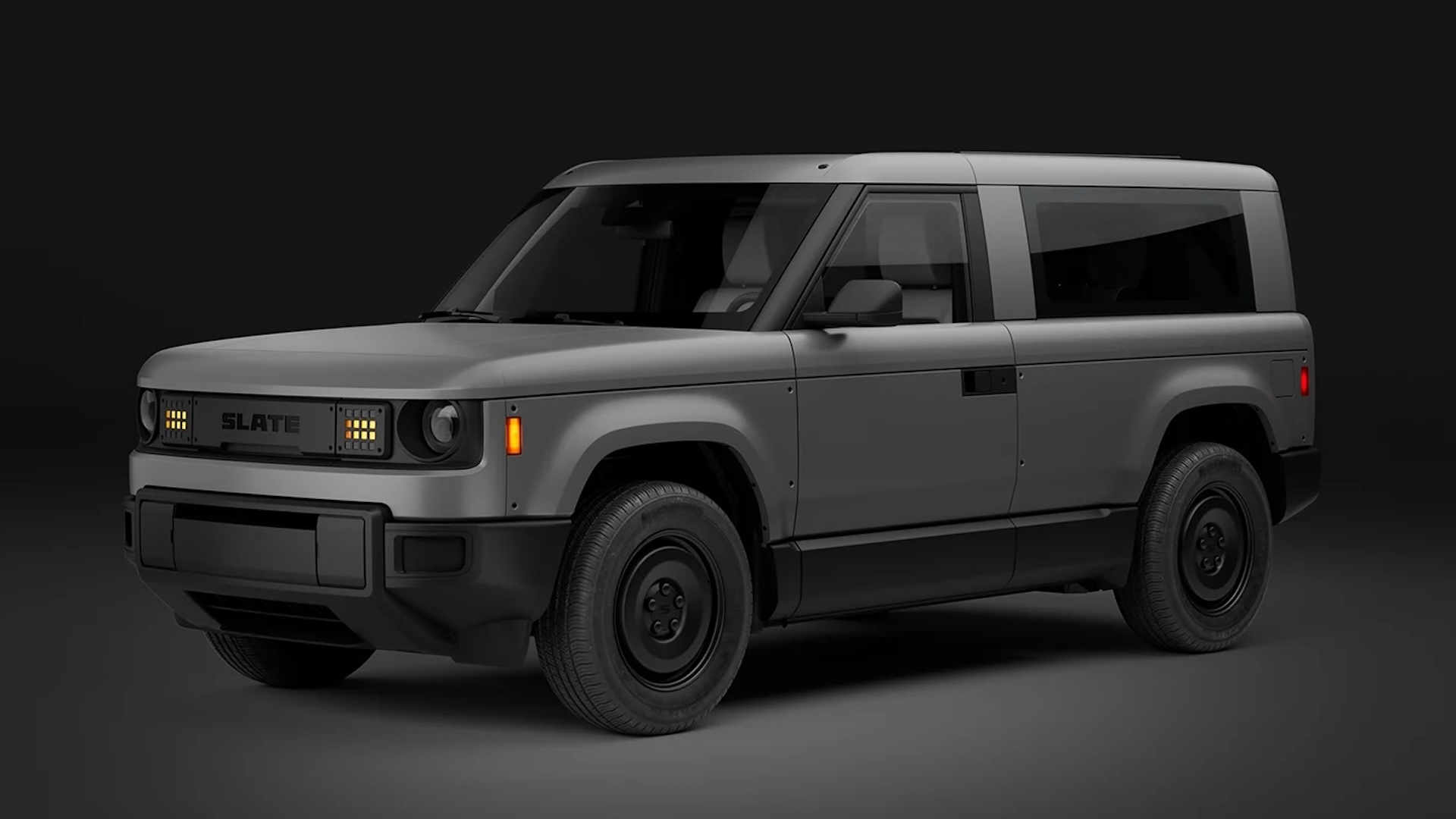 A gray electric SUV with a boxy design.