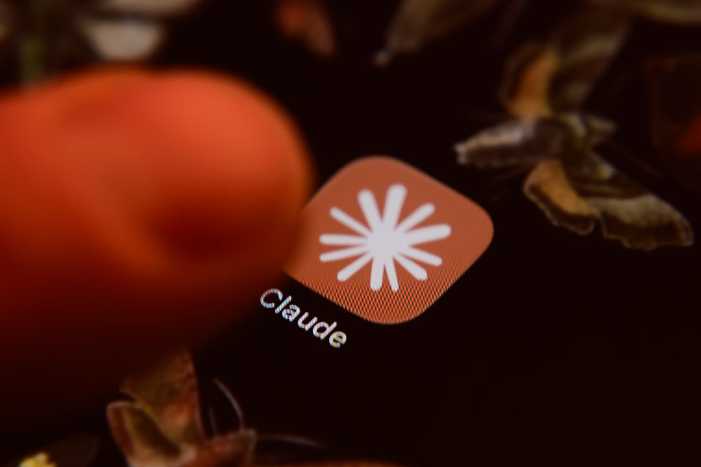 The Claude app icon is displayed on a smartphone screen