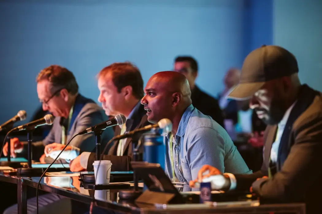 A panel of judges at ALL IN.